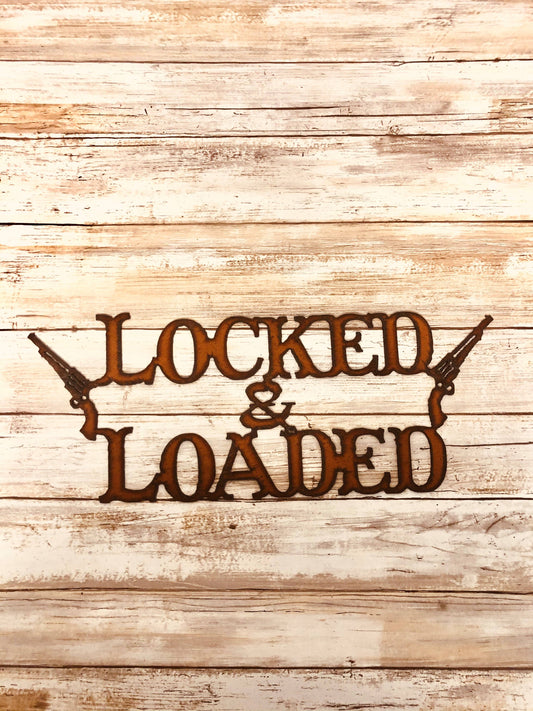 Locked and Loaded Gun Sign