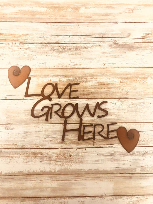 Love Grows Here Sign