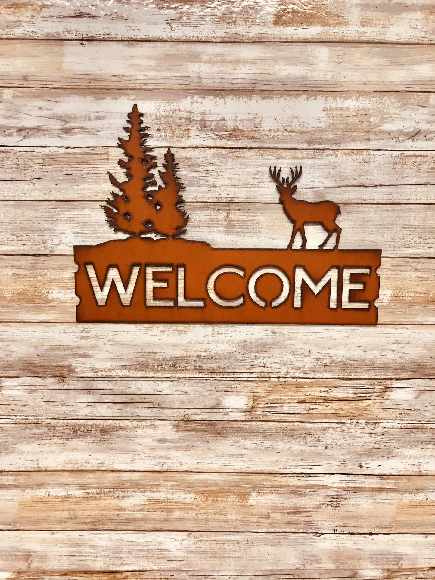 Deer and Trees Lodge Welcome Sign