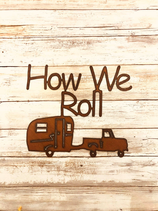 How we Roll Camper Trailer KOA Sign